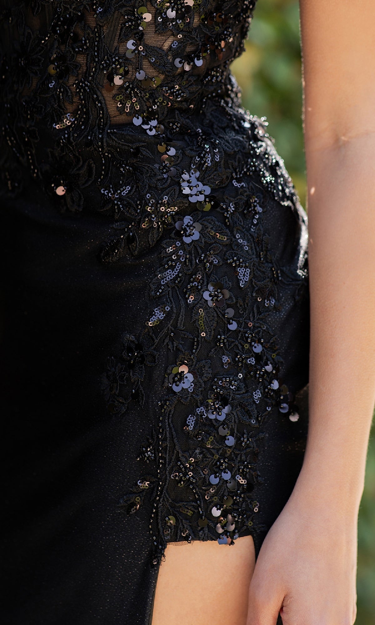 Close-up of Cinderella Couture 8162J: a black one-shoulder prom gown with stunning sequins, intricate beadwork, and a thigh-high slit—an elegant formal evening dress under $200.